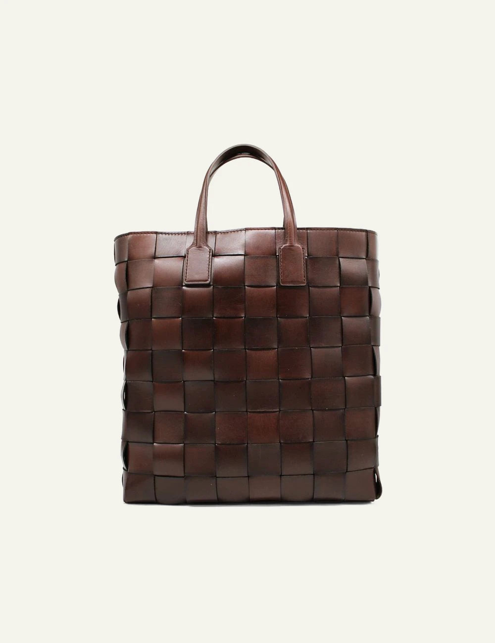 Dragon Diffusion dark brown woven leather tote bag with structured silhouette front view
