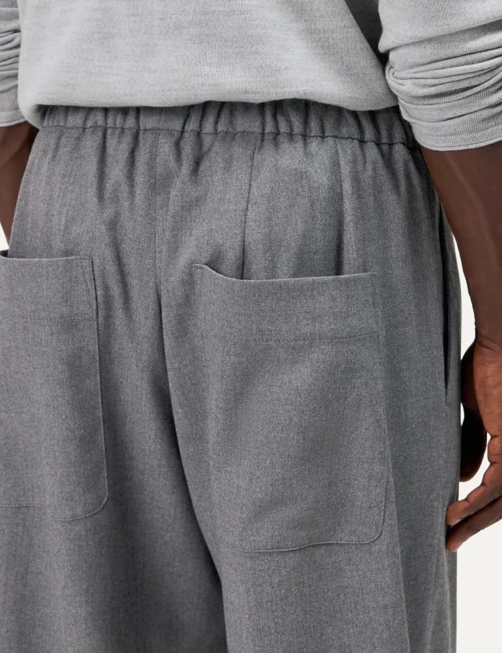 Drykorn men's grey melange wide leg trousers with an elasticated drawstring waistband and relaxed fit back detail