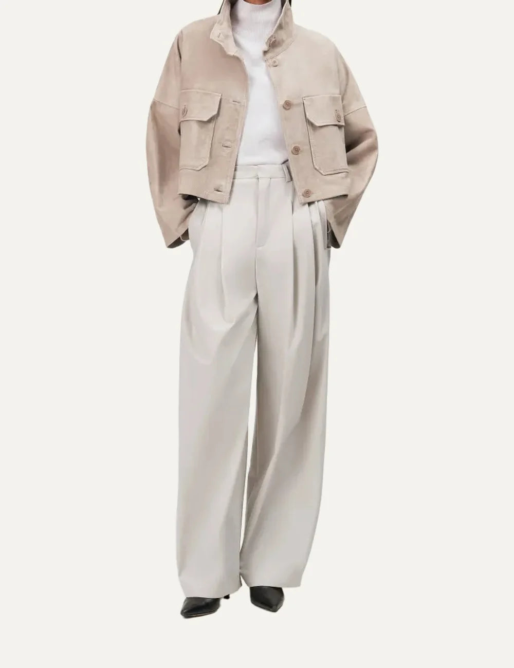 Drykorn women's Arklow light beige cropped leather jacket with an oversized boxy fit, stand collar, button closure and two flap chest pockets full body