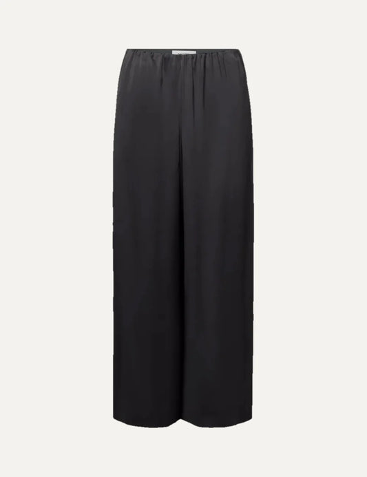 Drykorn women's black satin wide-leg trousers with an elasticated gathered waistband and relaxed flowing silhouette.