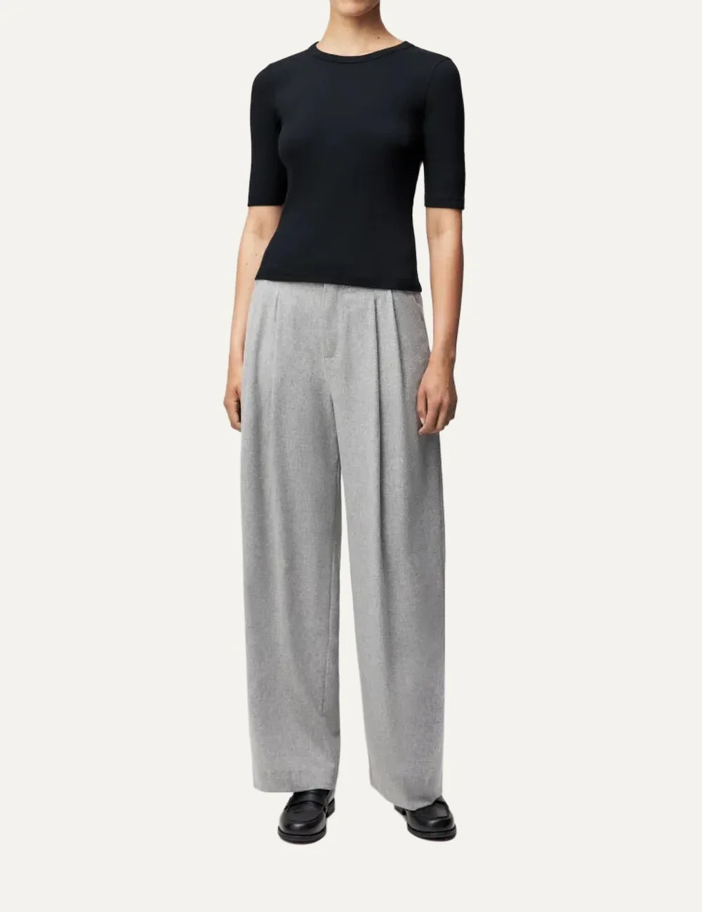 Drykorn women's black slim-fit T-shirt with a round neckline, three-quarter sleeves and fine ribbed cotton texture full body