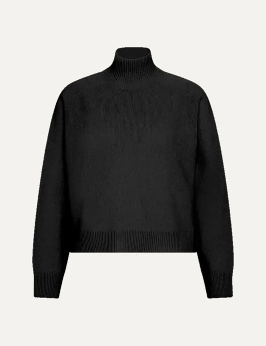 Drykorn women's black cropped wool knit sweater with a ribbed turtleneck, long sleeves, ribbed trims and side slits.