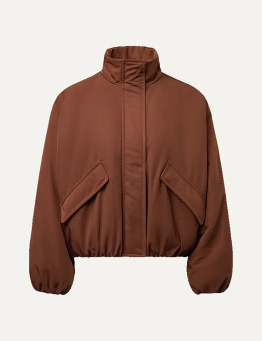 Drykorn women's Cadley brown oversized blouson jacket with a high stand collar, flap pockets and elasticated cuffs and hem.