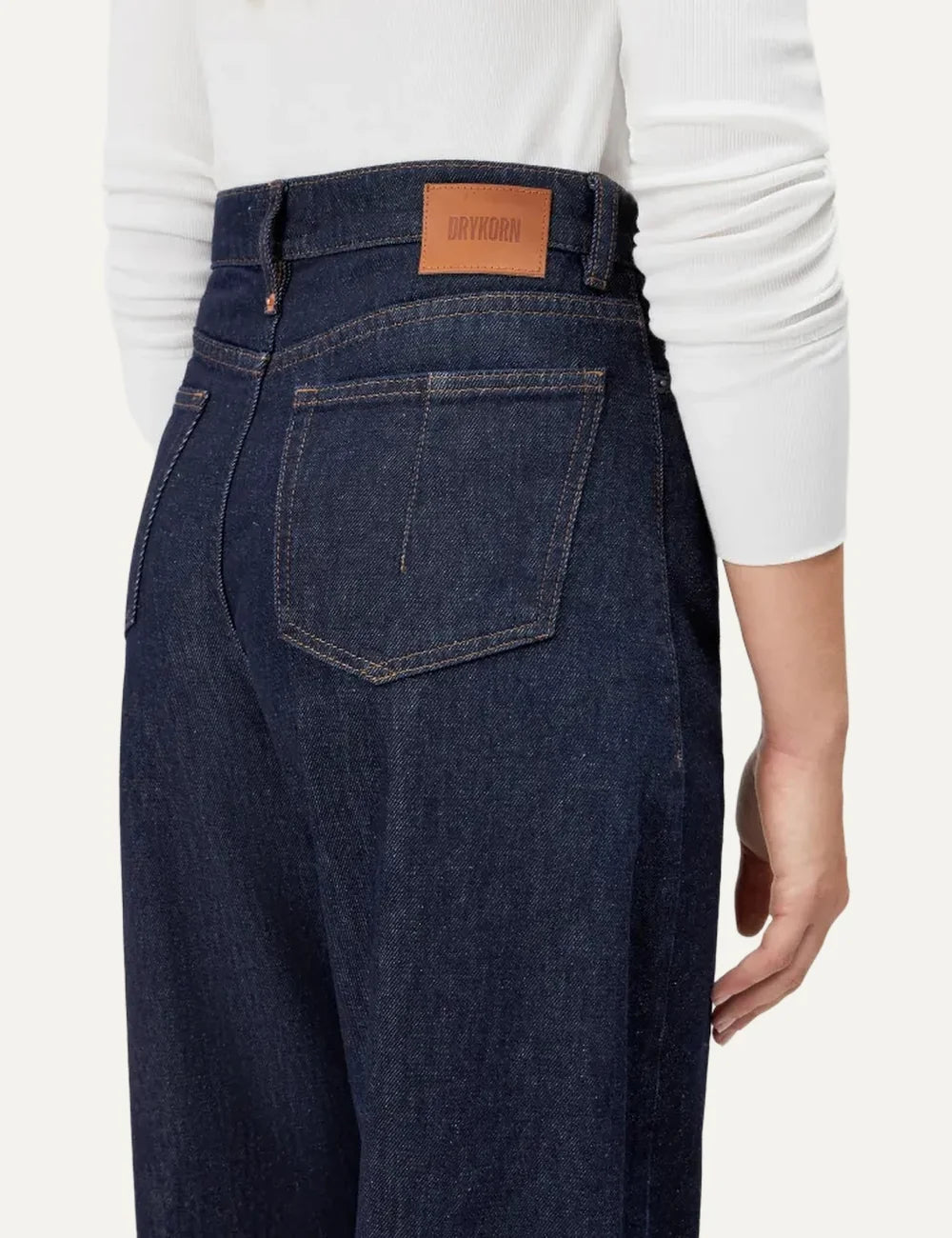 Drykorn women's dark blue high-waisted jeans with a relaxed fit, curved wide legs and classic five-pocket design back detail