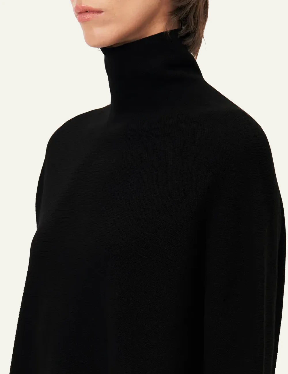 Women's DRYKORN Liora oversized merino wool turtleneck sweater in black detail