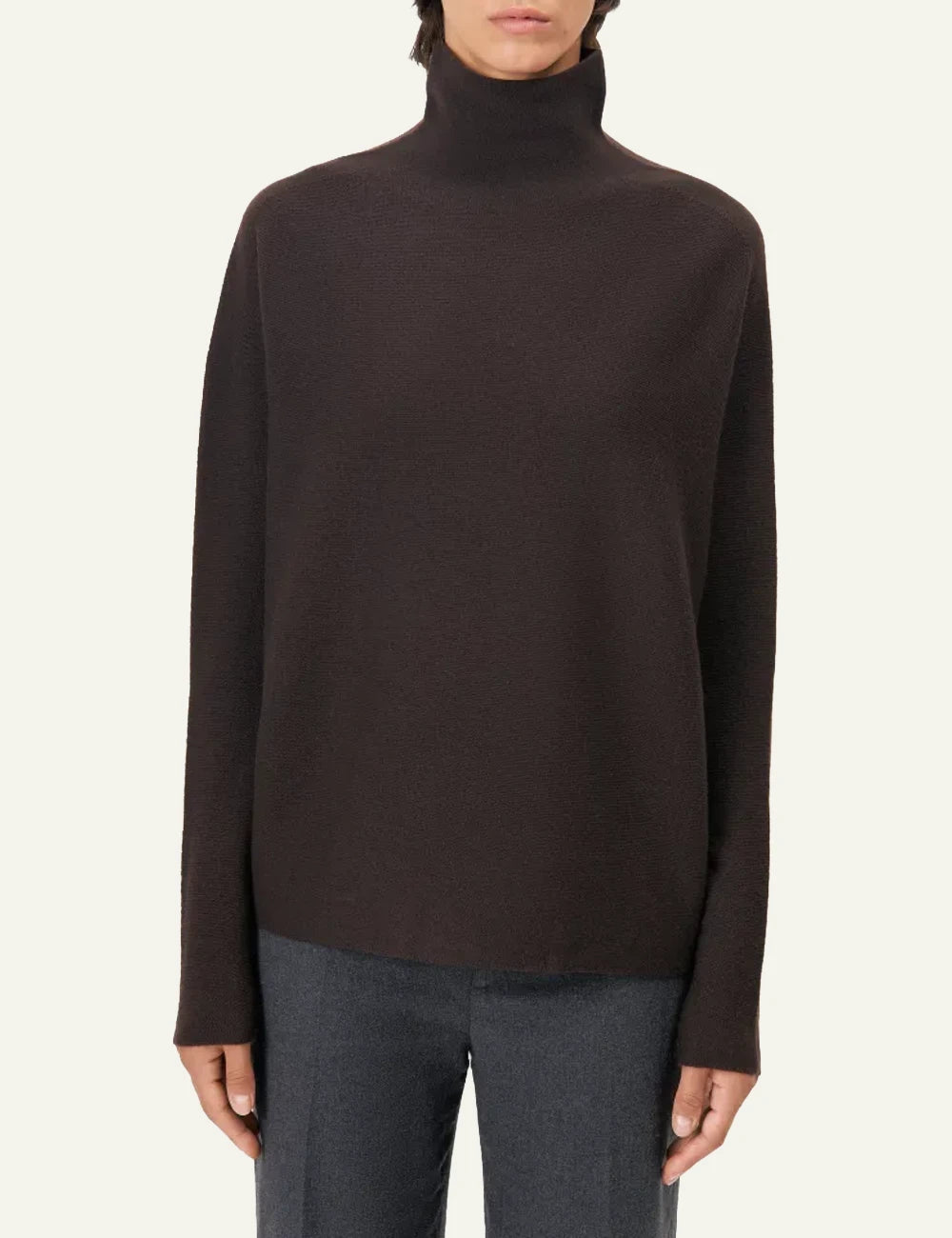 Women's DRYKORN Liora oversized merino wool turtleneck sweater in dark brown model