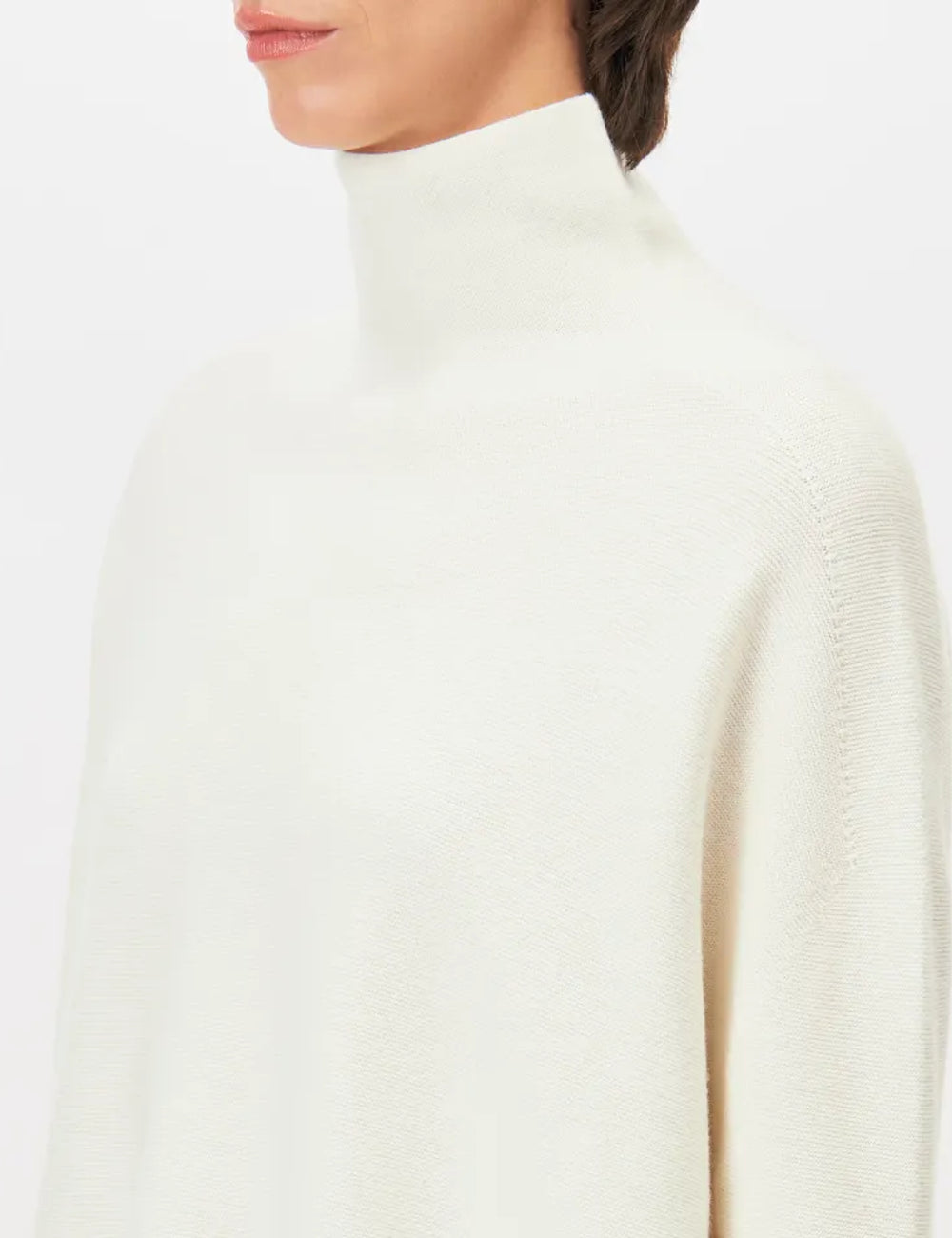 Women's DRYKORN Liora oversized merino wool turtleneck sweater in ivory detail