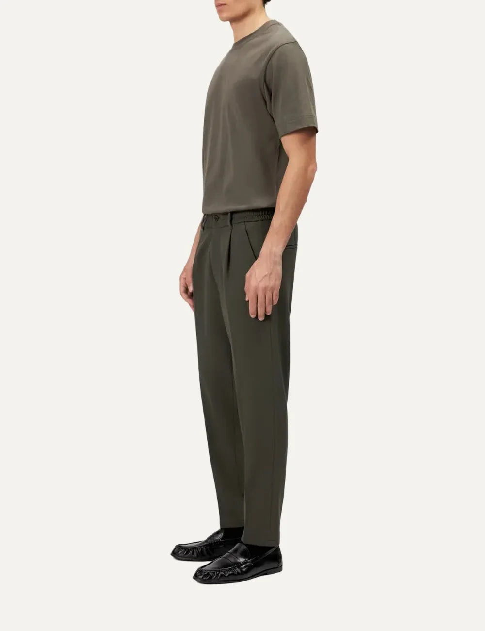 Drykorn women's olive green Chasy tailored trousers with front pleats, tapered legs, belt loops and cropped length side