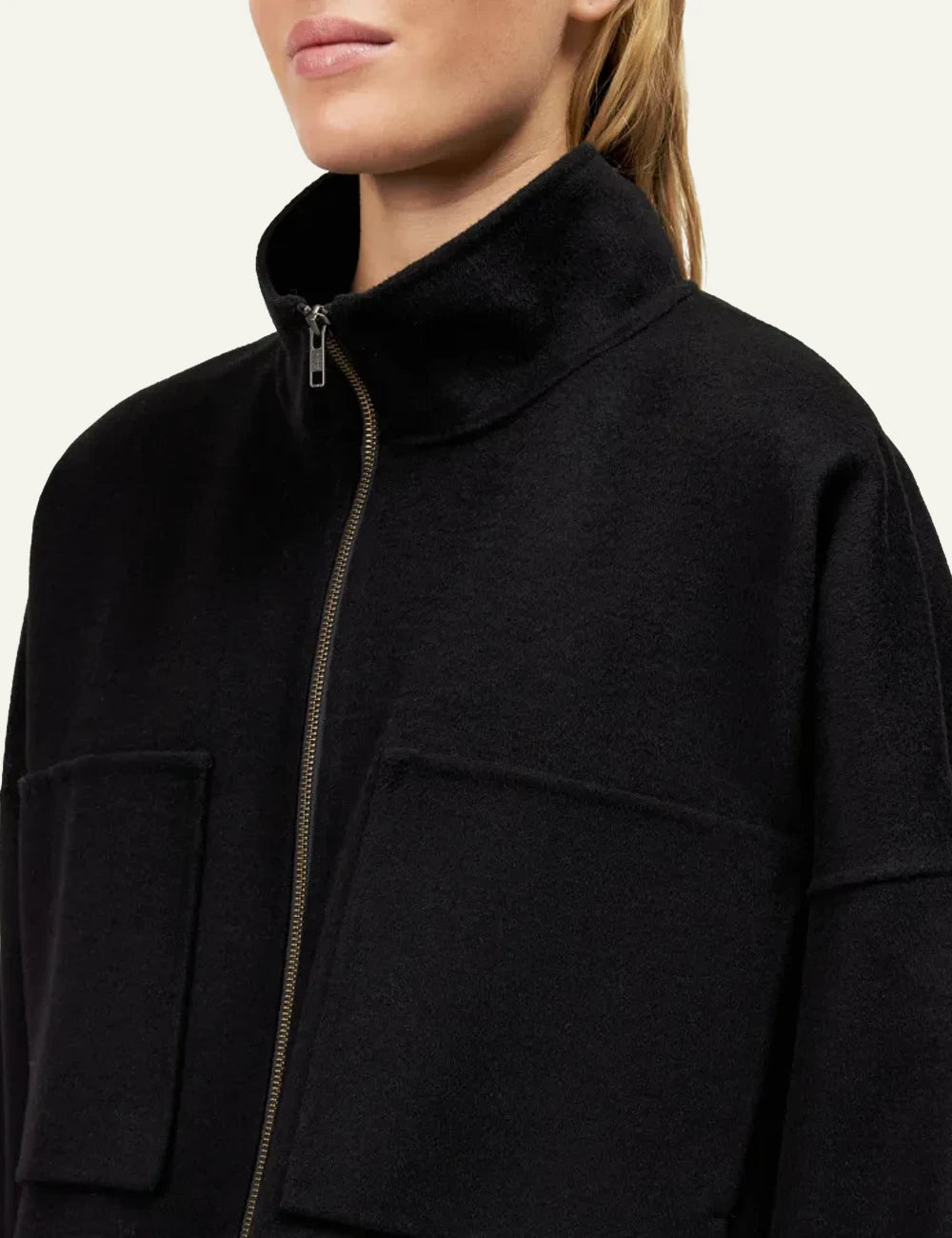 Women's DRYKORN oversized cropped wool jacket in black with stand collar and patch pockets side detail
