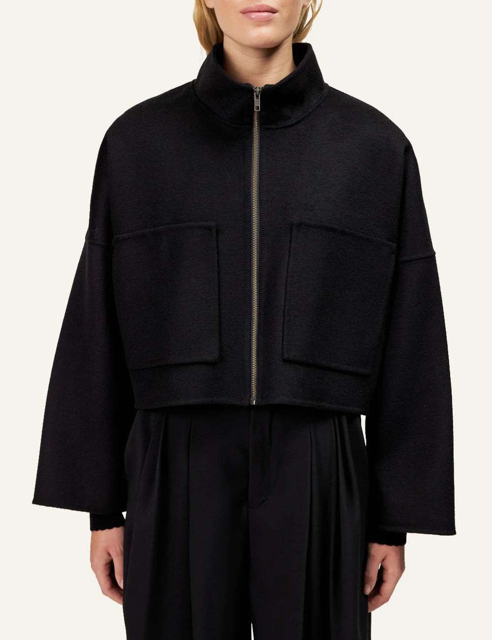 Women's DRYKORN oversized cropped wool jacket in black with stand collar and patch pockets model