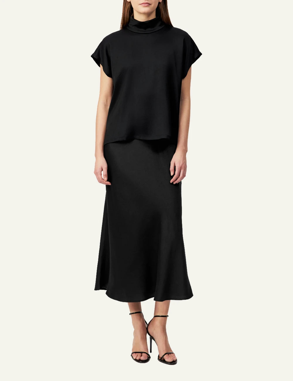 Women's DRYKORN satin blouse in black with stand collar and relaxed fit full body