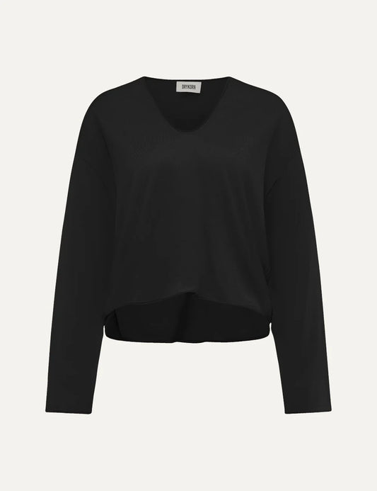 Drykorn women's Somaija black oversized knit sweater with a round neckline, dropped shoulders, long sleeves and a cropped curved hem.