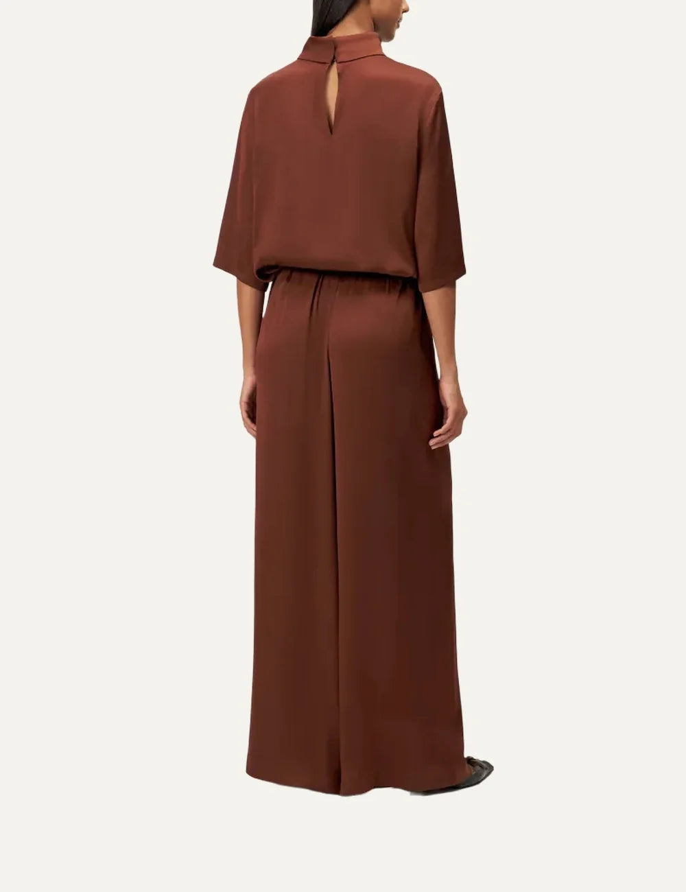 Drykorn women's terracotta satin wide-leg trousers with an elasticated gathered waistband and relaxed flowing silhouette back