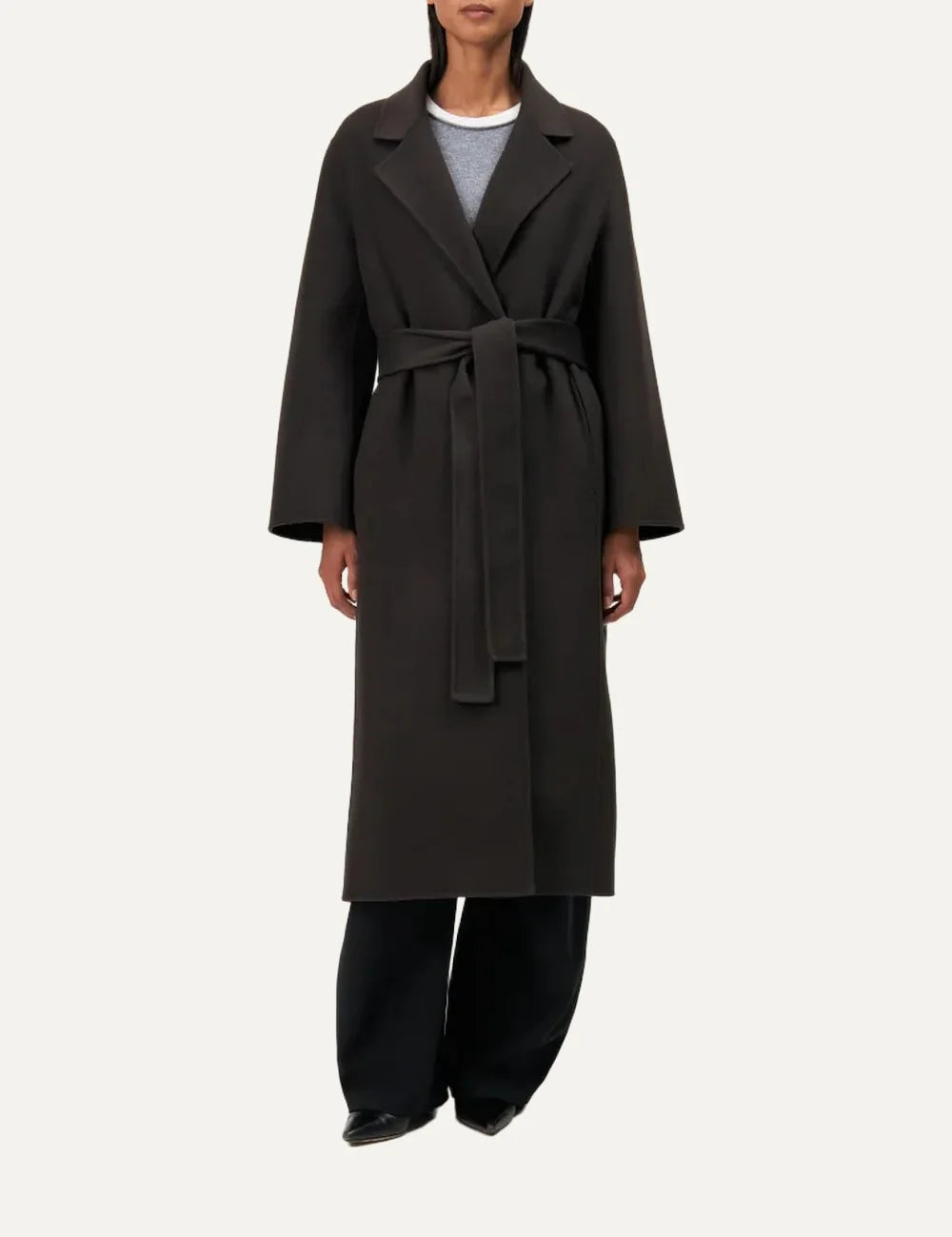 Drykorn women's Upavon dark brown long wool blend coat with wide lapels, double-breasted button closure and tie waist belt.