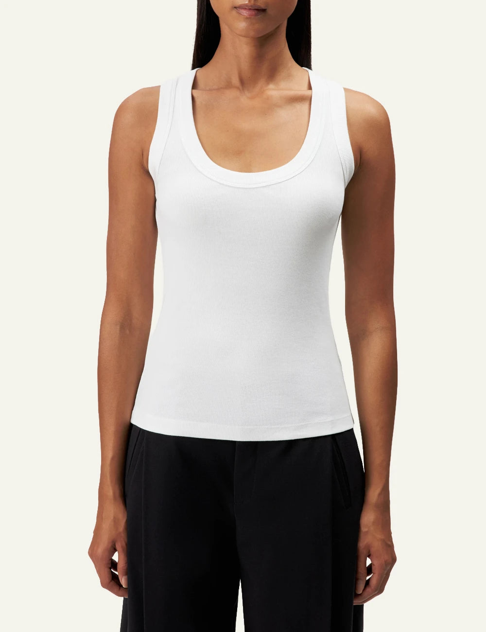 Women's DRYKORN white ribbed cotton tank top with scoop neck and slim fit model
