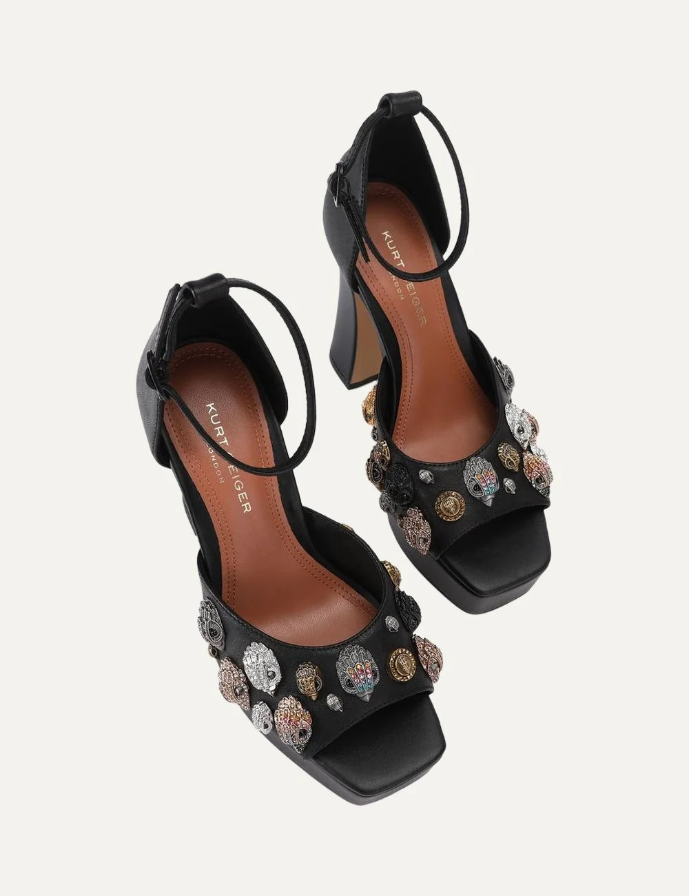 Kurt Geiger London black leather platform sandals with open toe, embellished eagle head details, ankle strap and high block heel top
