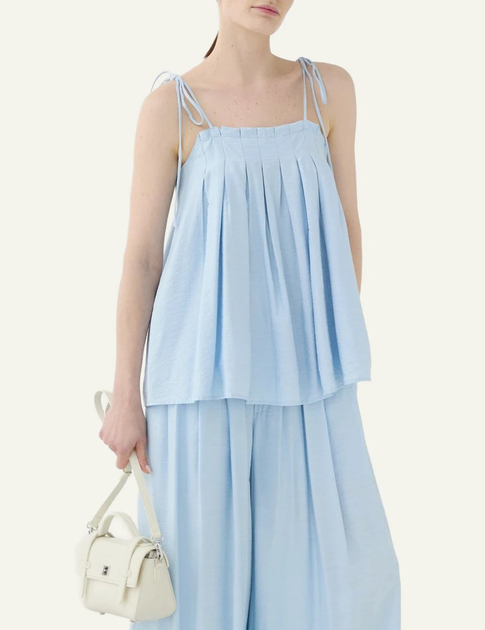 Eleh baby blue pleated top spaghetti straps front model view