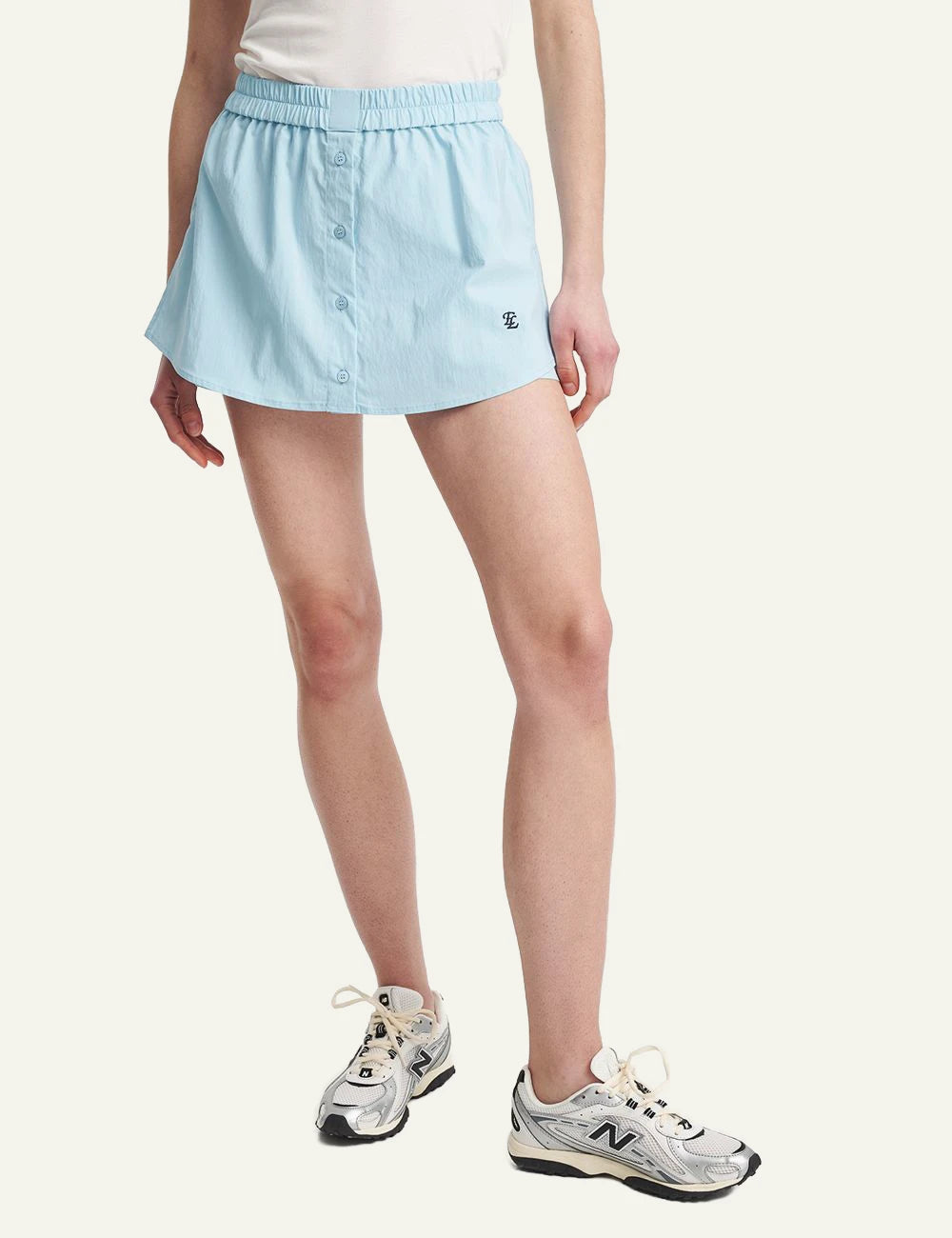 Eleh light blue skort button detail mini skirt front model view
