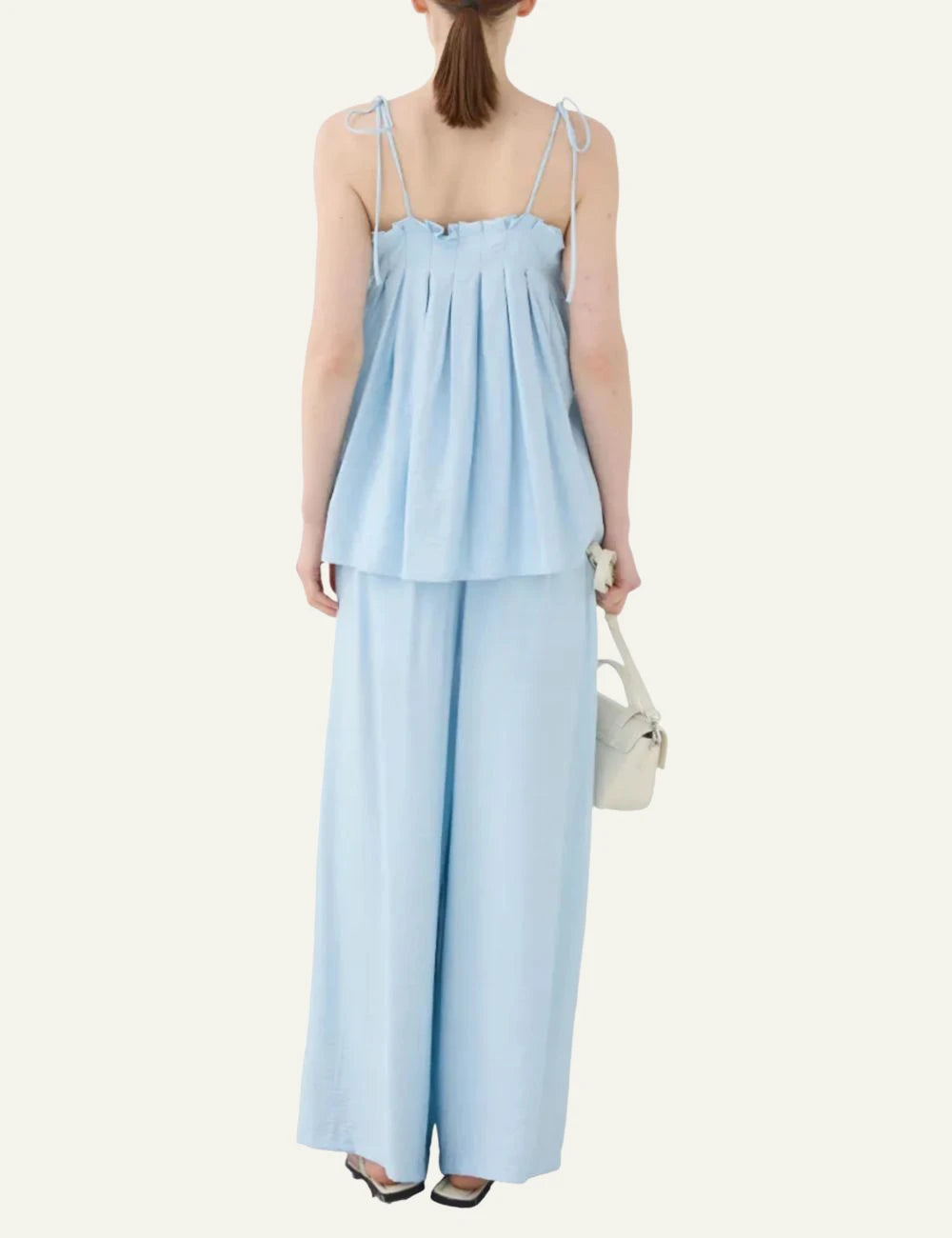 Eleh baby blue pleated top spaghetti straps back model view