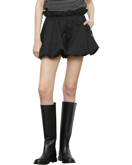 ELEH women's black high-waisted balloon shorts with elasticated gathered waistband, voluminous silhouette and silver-tone zip pockets.