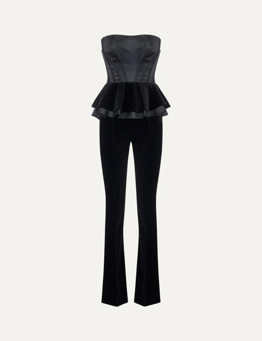 Elisabetta Franchi women's black strapless jumpsuit with structured corset bodice, double peplum waist and long velvet wide-leg trousers.