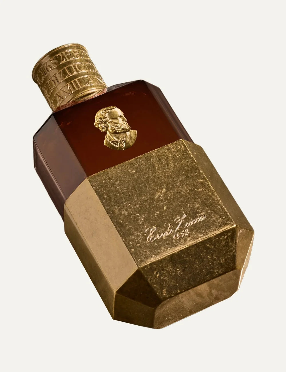 Eredi Zucca Cuoio unisex Eau de Parfum 100ml in an amber brown glass bottle with antique gold metallic base, embossed Giuseppe Verdi portrait medallion and engraved gold cap detail