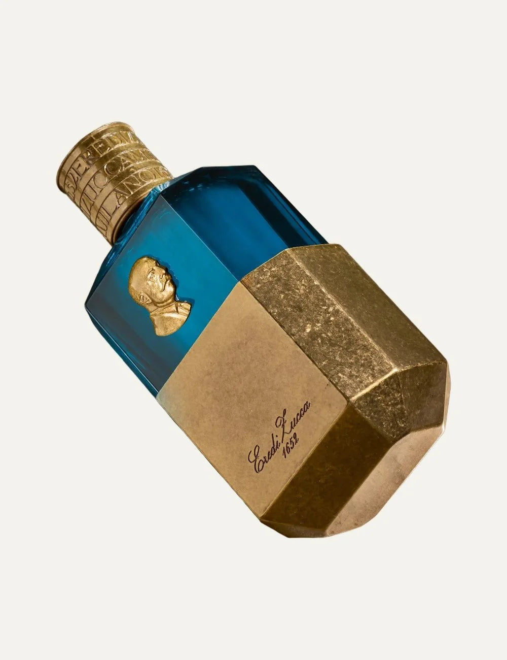 Eredi Zucca unisex Novecento perfume 100ml in a luxurious blue glass bottle with antique gold metallic detailing, embossed portrait medallion and engraved gold cap detail