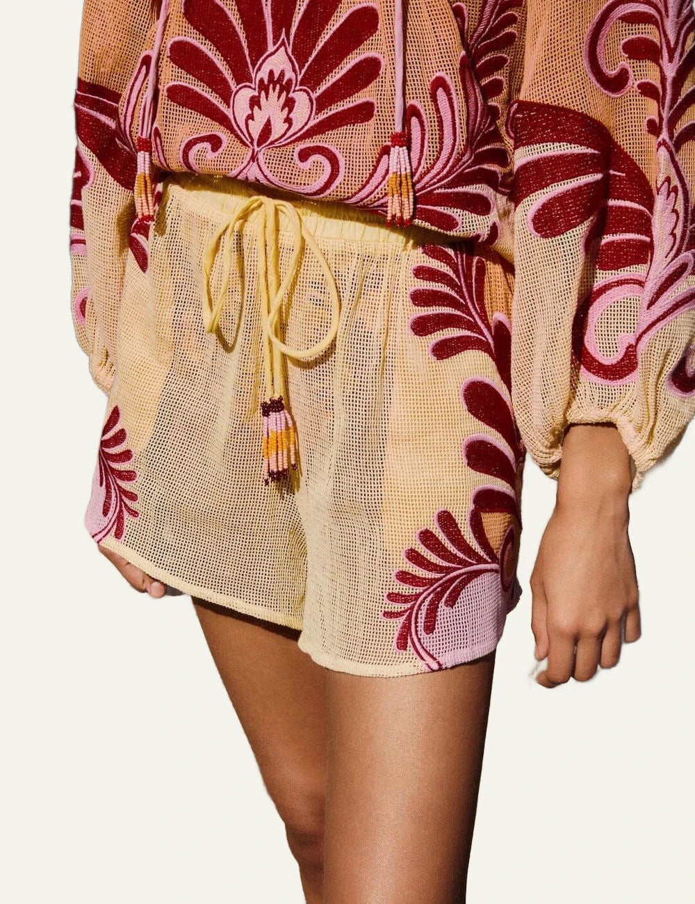 Farm Rio arabesque shorts soft yellow beach look worn side view