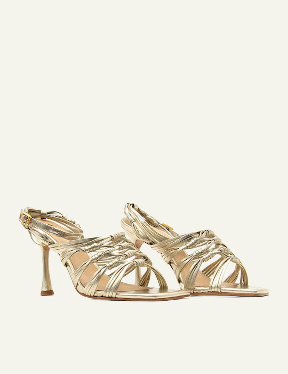 Carrano strappy sandal gold leather stiletto angled view