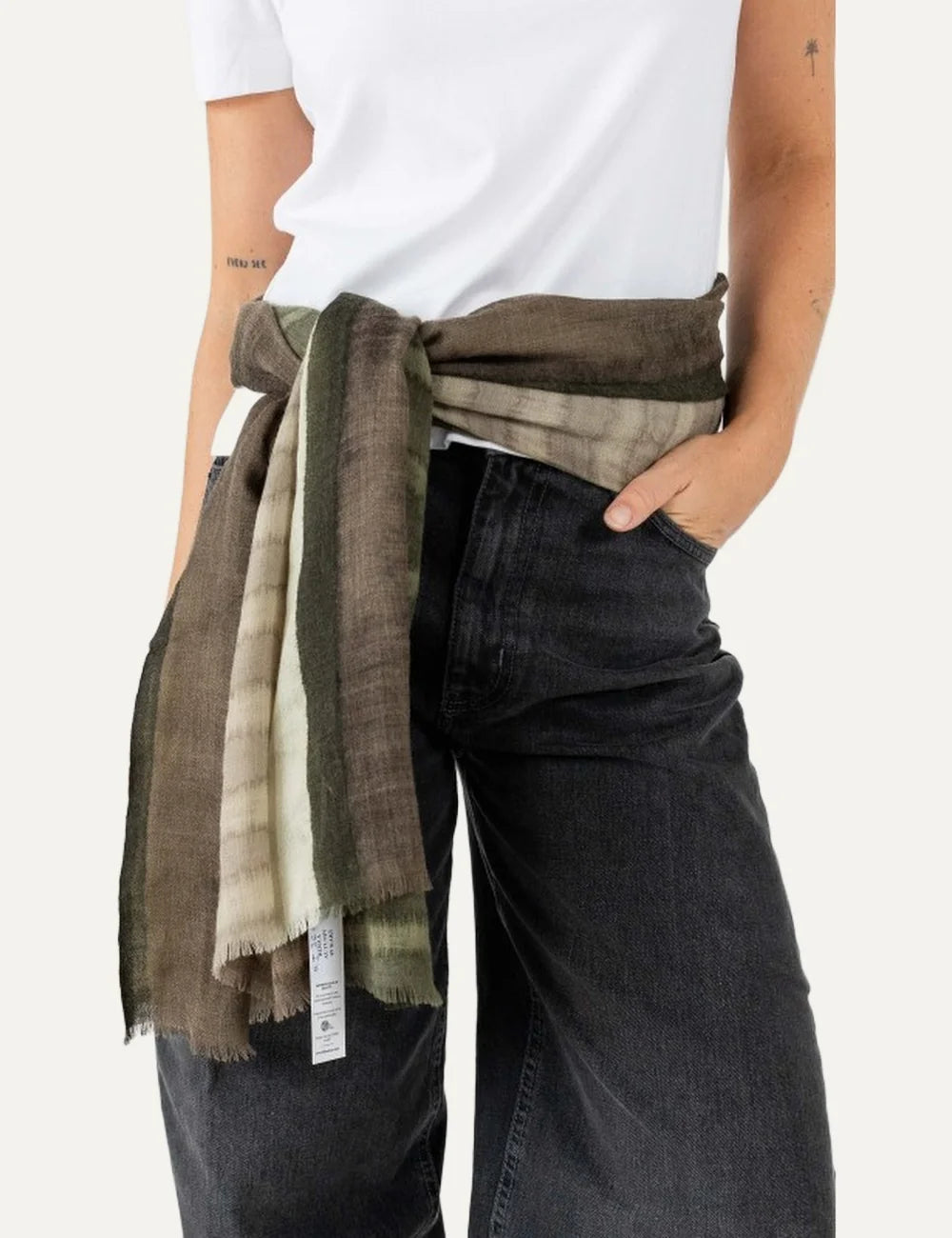 Biba rectangular wool scarf in beige, olive green and brown with soft plaid pattern and fringed edges model