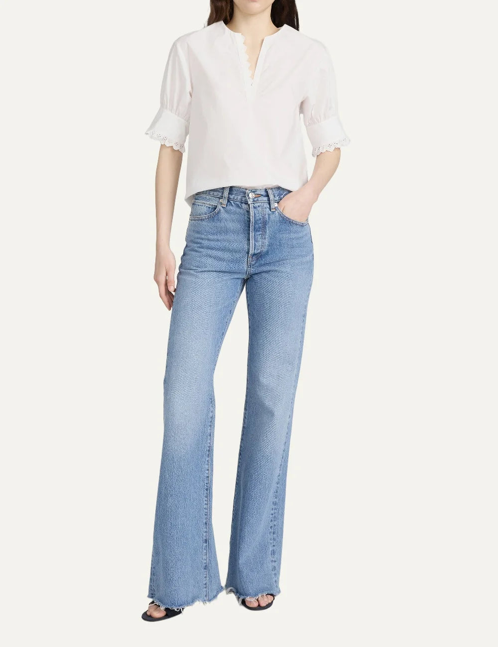 FRAME women's blue denim wide leg flare jeans with raw hem full body