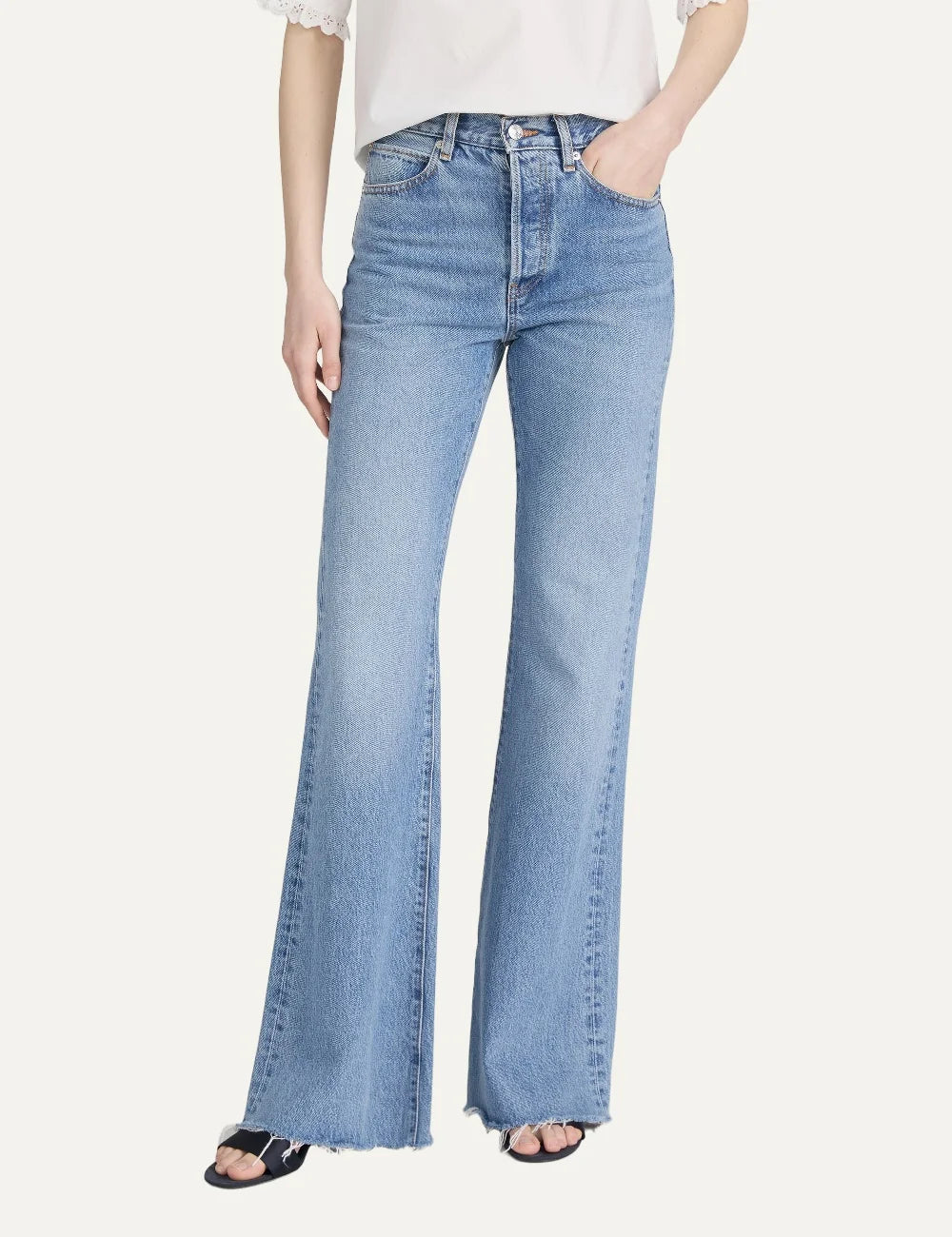 FRAME women's blue denim wide leg flare jeans with raw hem model