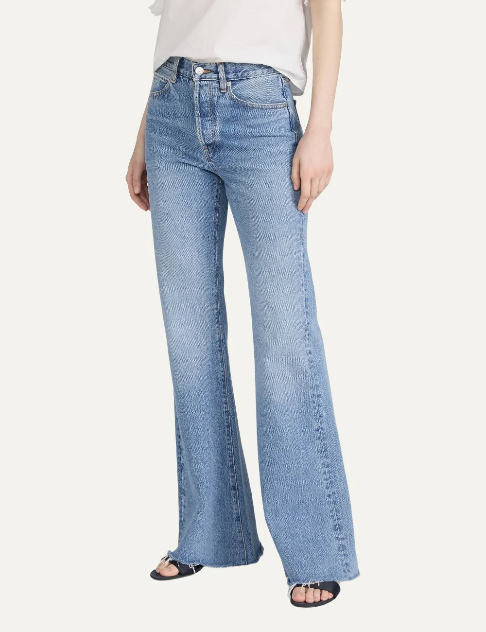 FRAME women's blue denim wide leg flare jeans with raw hem side