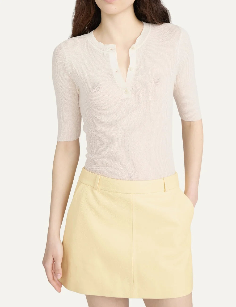 FRAME women's cream rib knit short sleeve Henley top model
