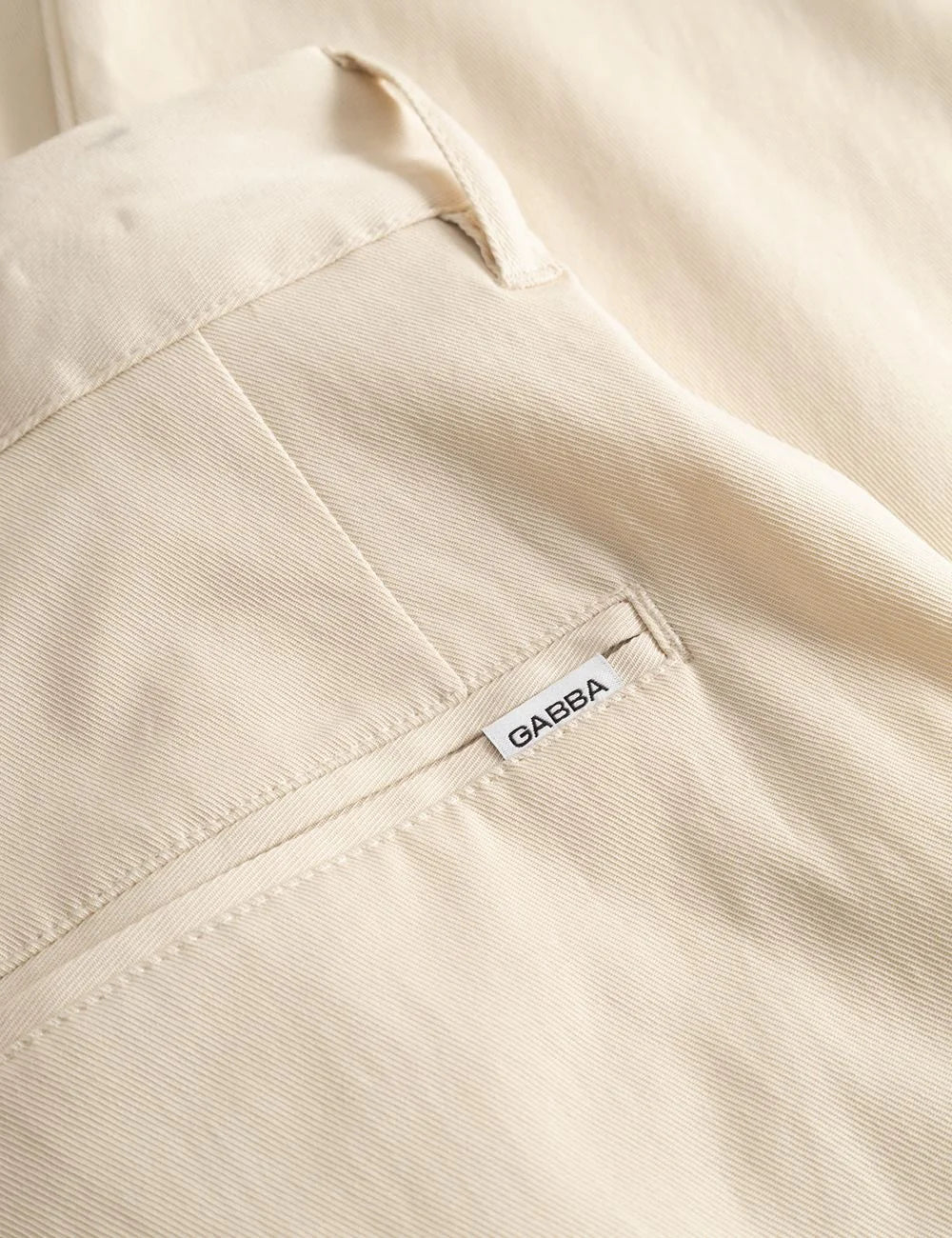 Gabba cropped trousers beige relaxed fit pleated back detail view