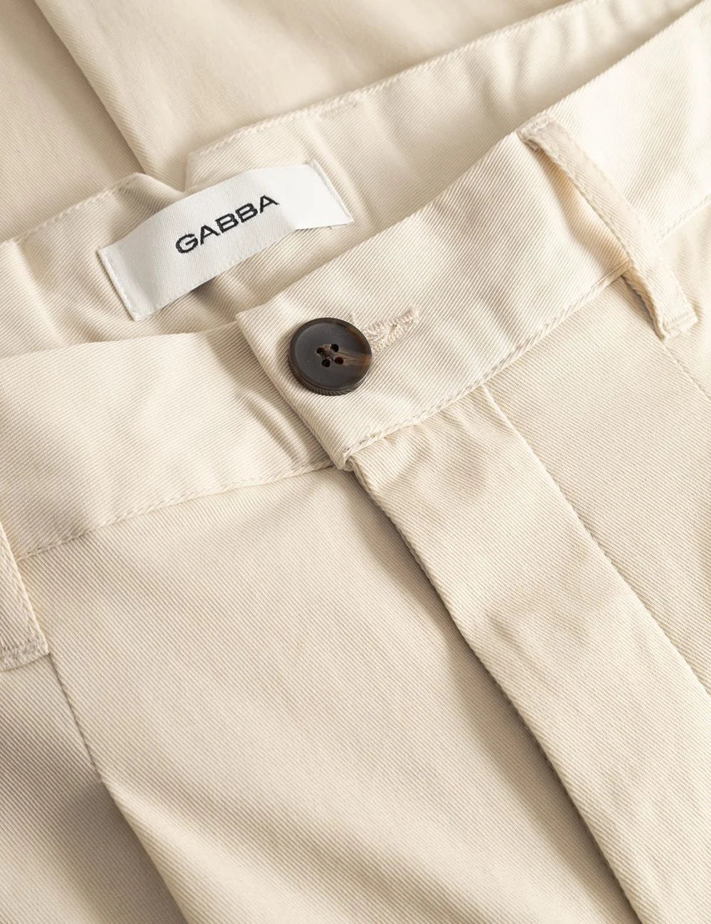 Gabba cropped trousers beige relaxed fit pleated front detail view