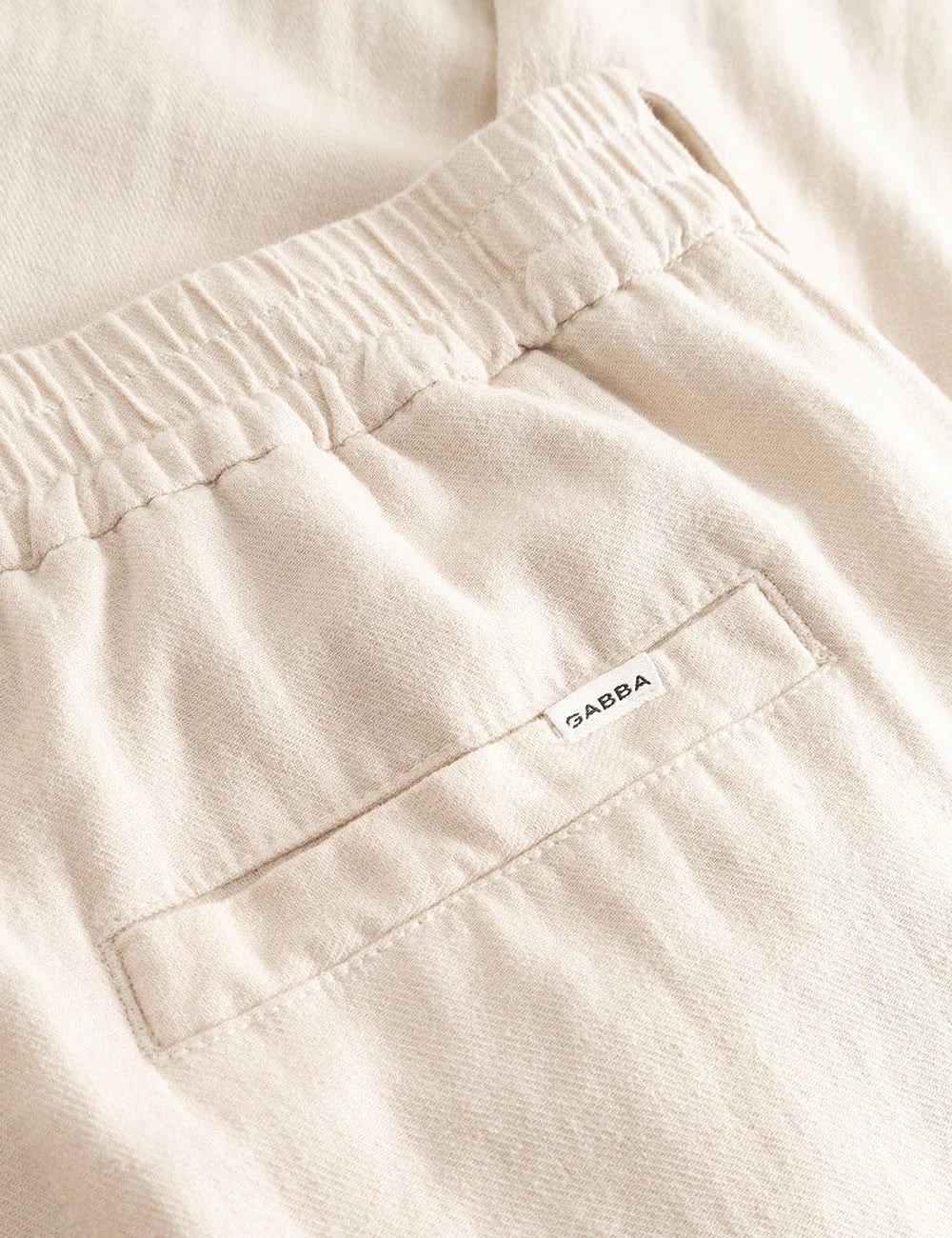 gabba linen trousers cream logo view