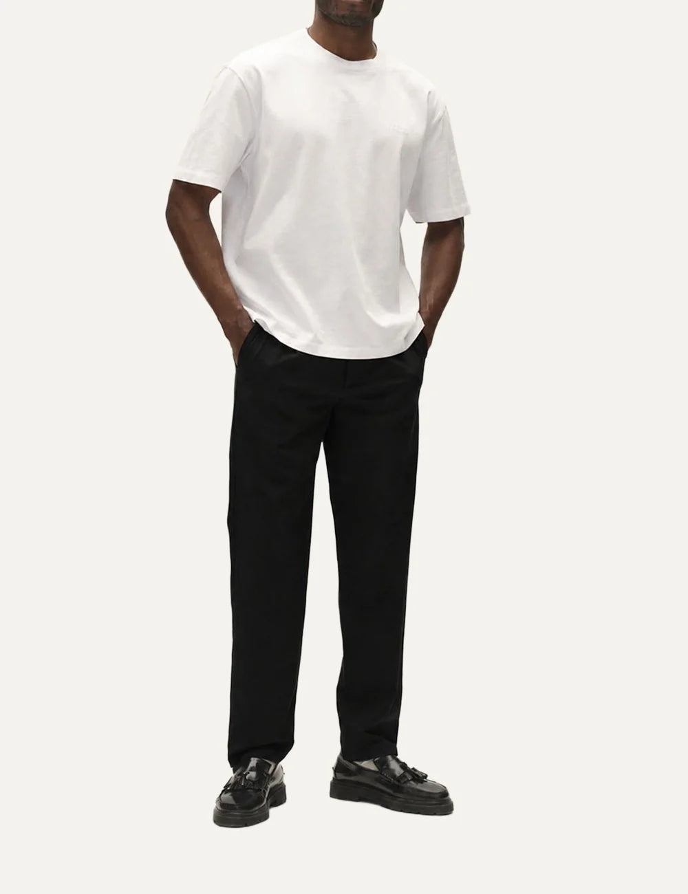 Gabba men's black regular straight fit chino trousers with front pleats, angled side pockets and elasticated back waistband front view