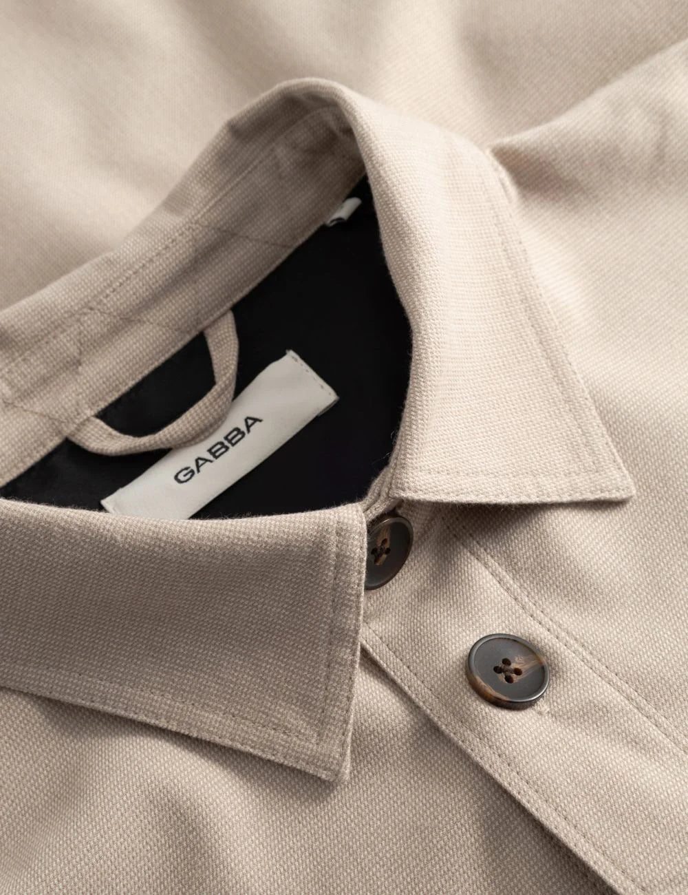 Gabba overshirt beige micro pattern button front chest pockets front detail view