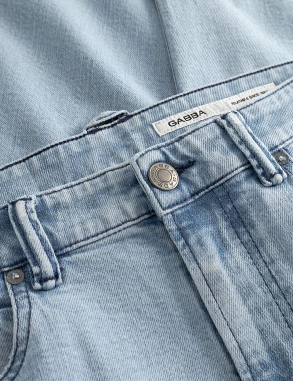 Gabba relaxed tapered jeans light blue bleached wash detail view