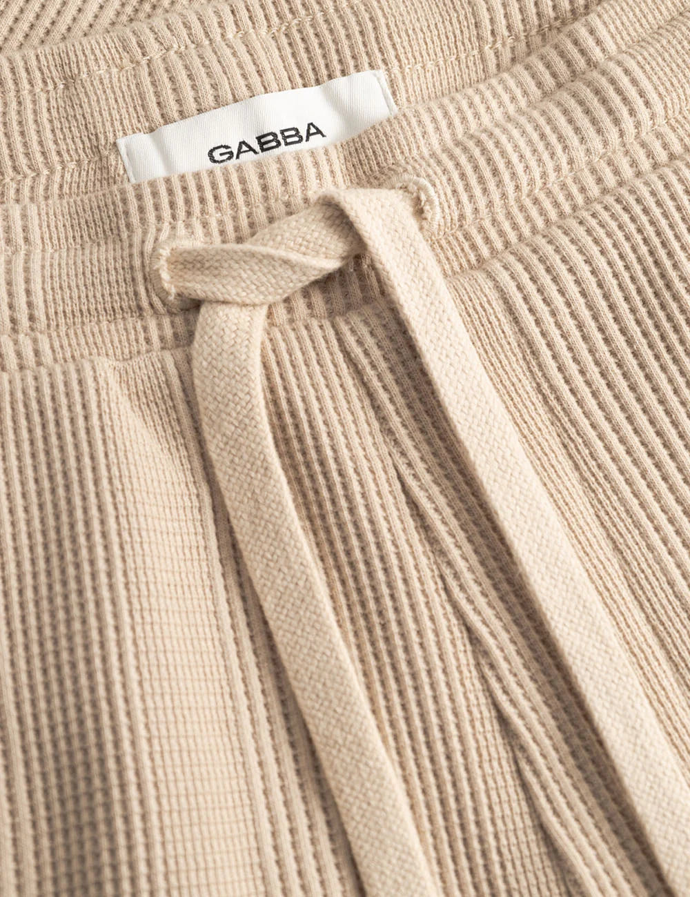 gabba drawstring shorts textured sand front detail view