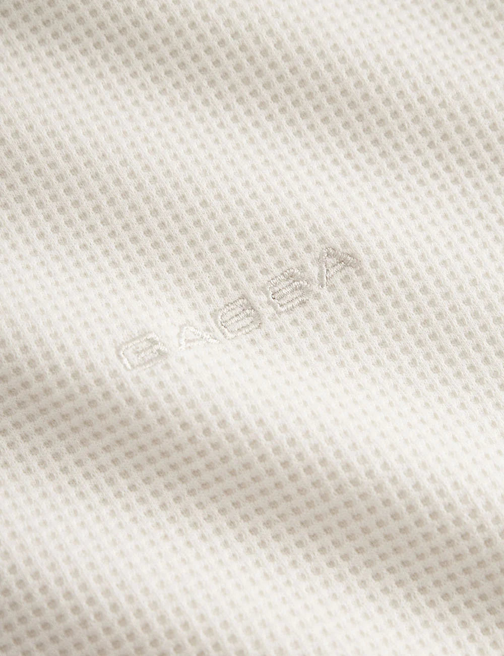 gabba textured polo shirt cream logo view