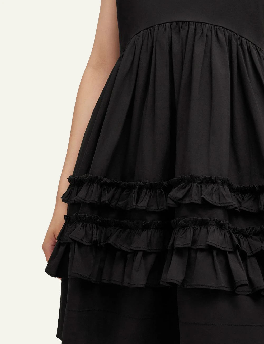 Ganni black mini dress frill detail close up organic cotton