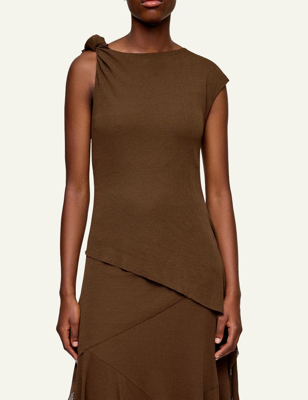 Ganni brown sleeveless midi dress with draped knot detail front model detail view