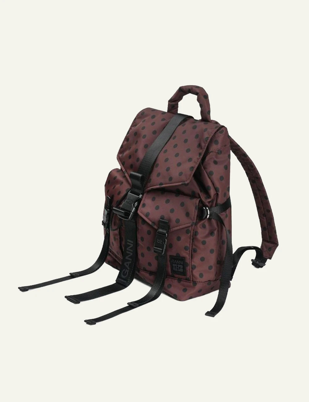 Ganni brown polka dot nylon backpack with black straps and front buckle closure side