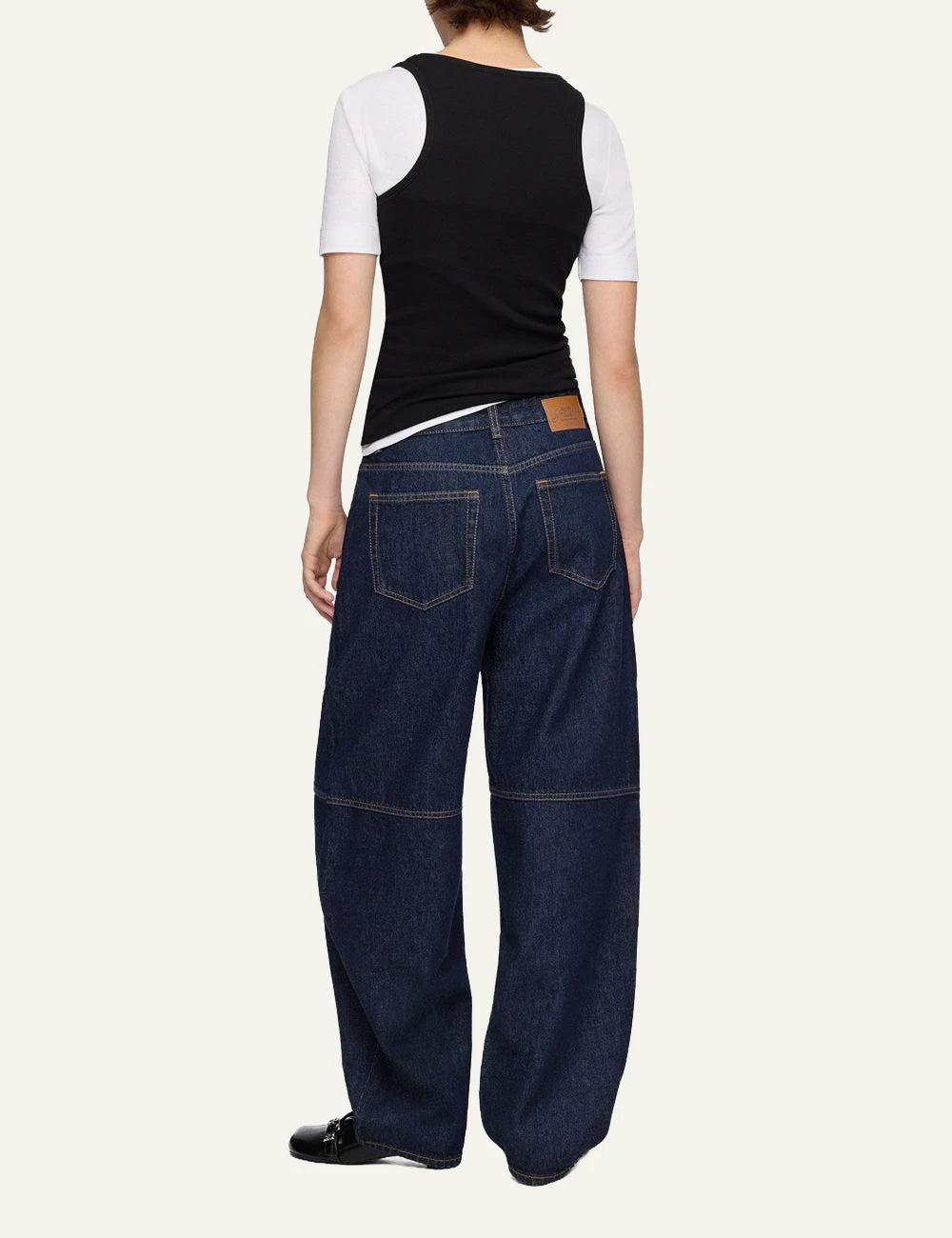 Ganni dark rinse barrel leg denim jeans back view