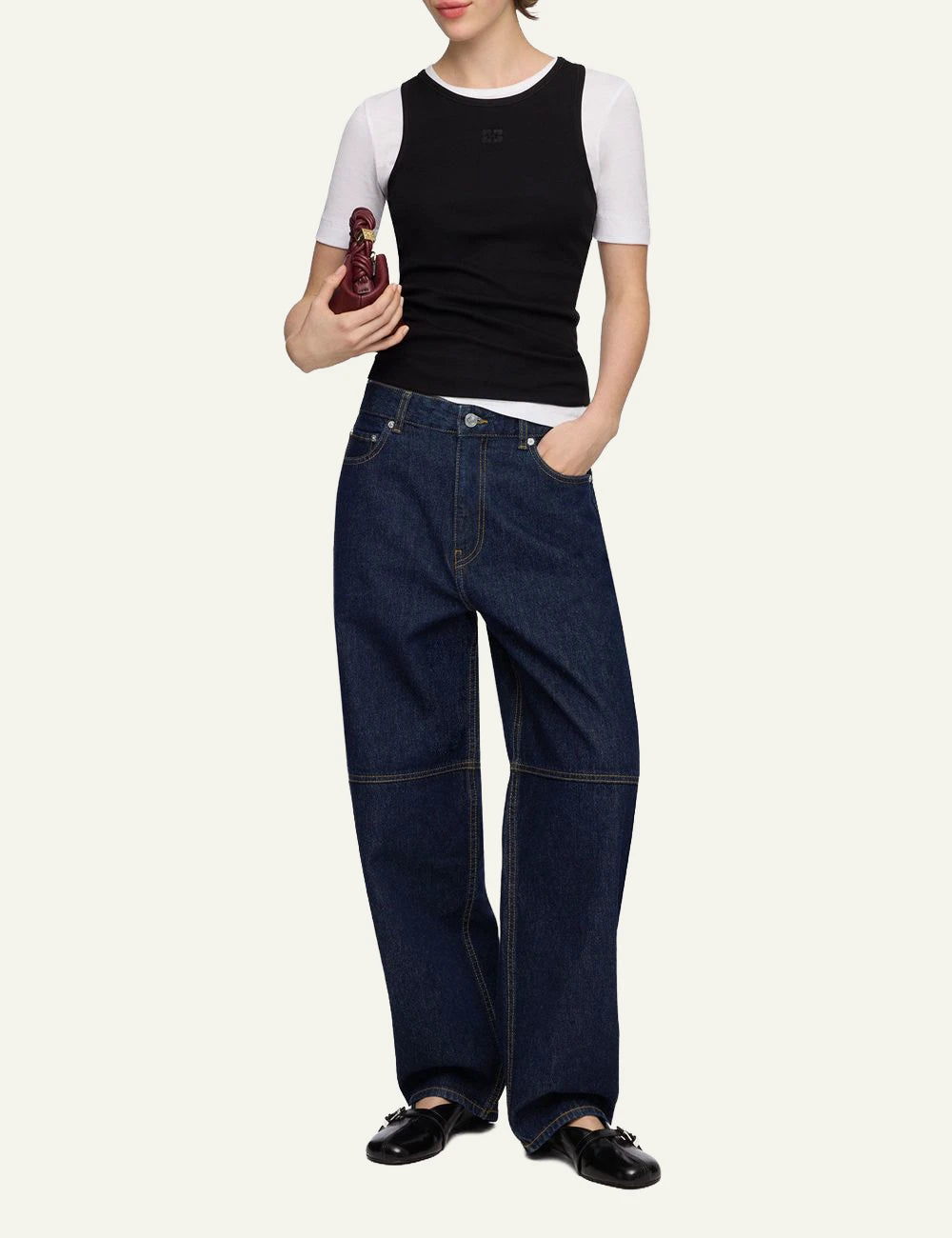 Ganni dark rinse barrel leg denim jeans front full body view