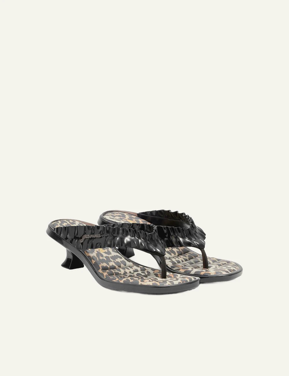 Ganni black heeled flip flop sandal with ruffle strap profile view