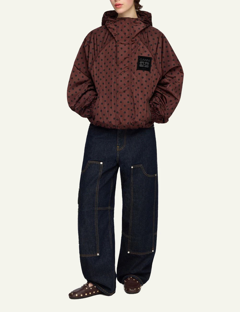 Ganni brown polka dot hooded jacket with logo patch front full body view