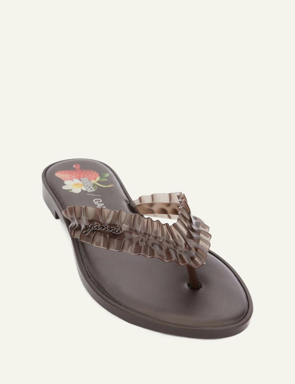 Ganni brown flip flop sandal with ruffle strap angled view